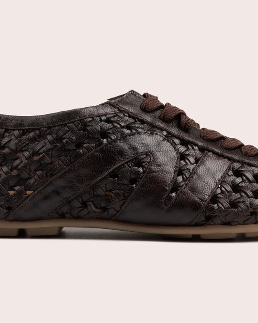 Dark brown woven leather sneaker detail