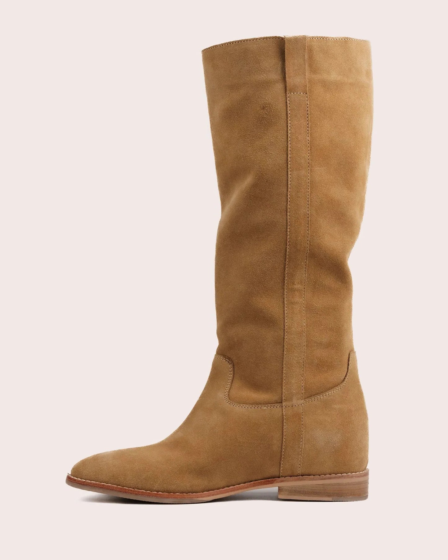 Beige suede ladies boot with inside wedge side view