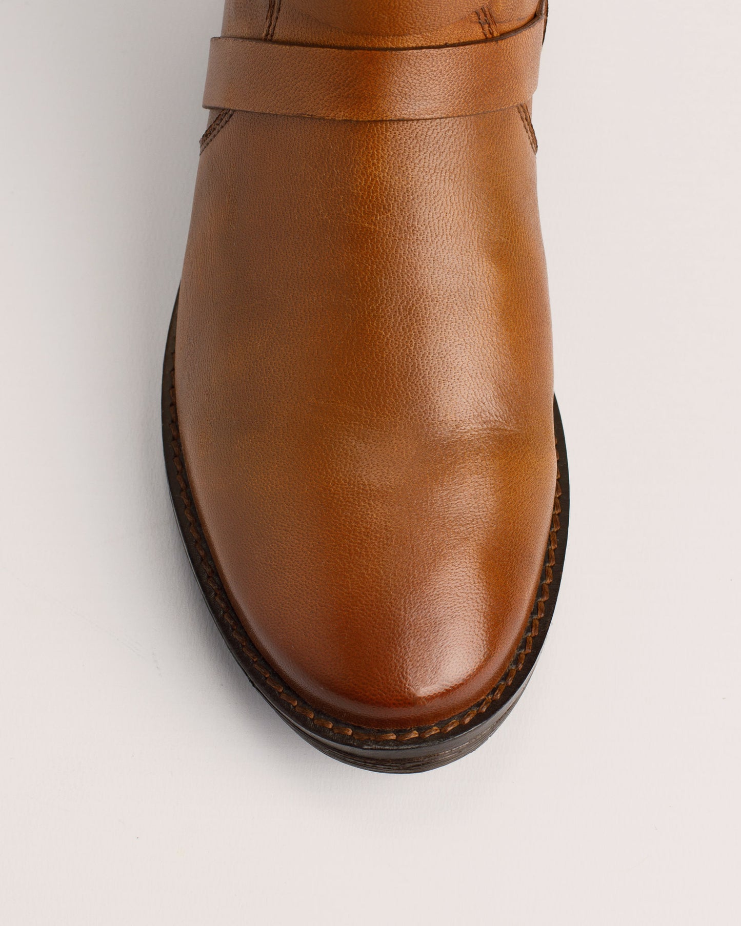 Side view of Babila cognac leather riding style boots with 38 cm shaft