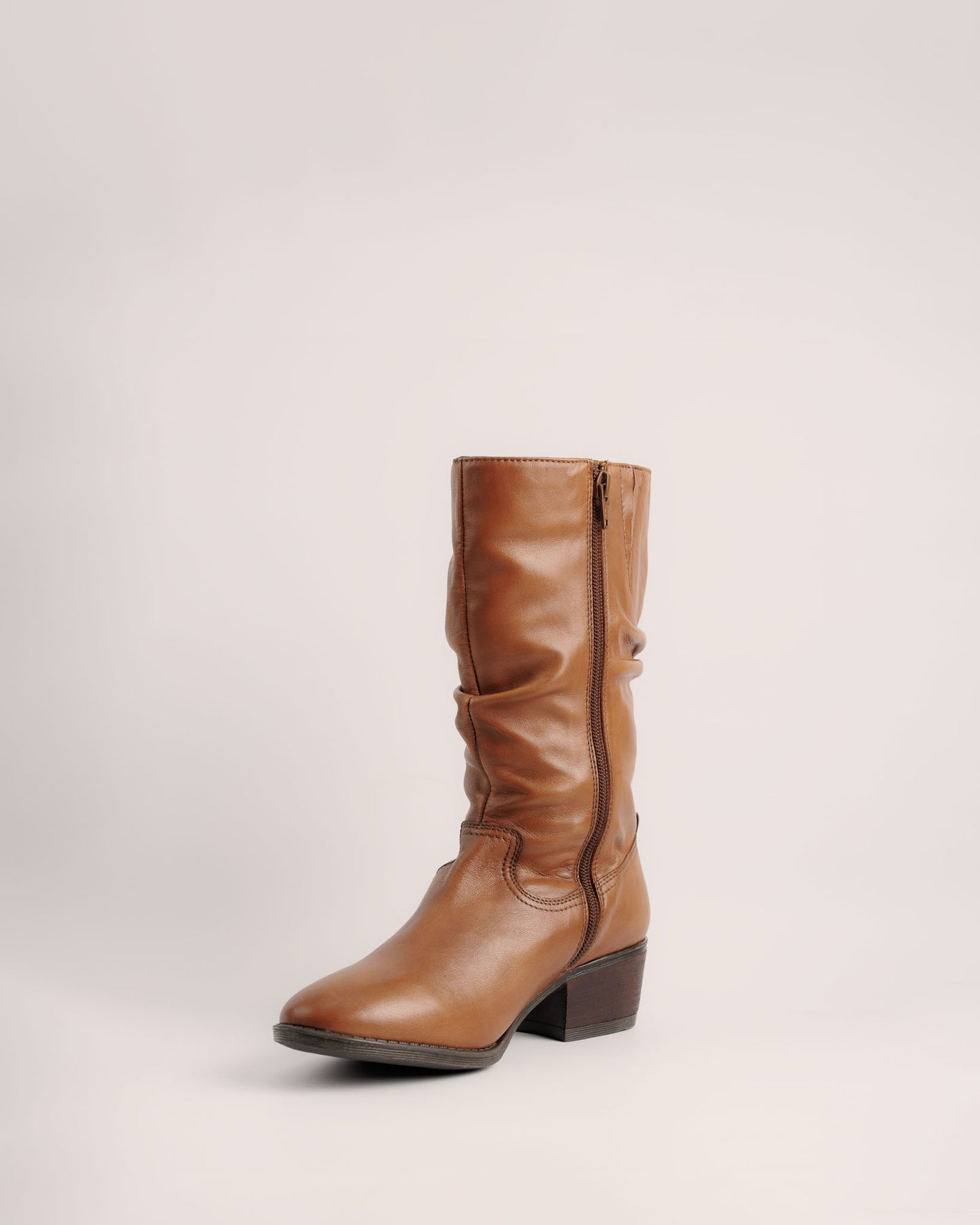 Close-up of the soft slouch shaft in cognac leather