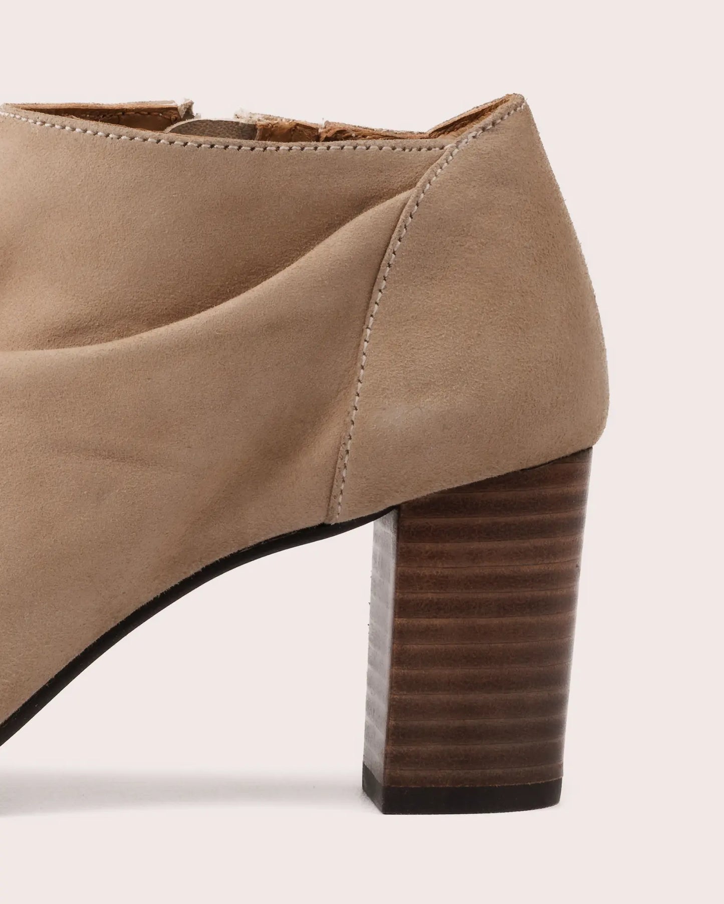 Beige suede open toe heeled sandal detail of heel