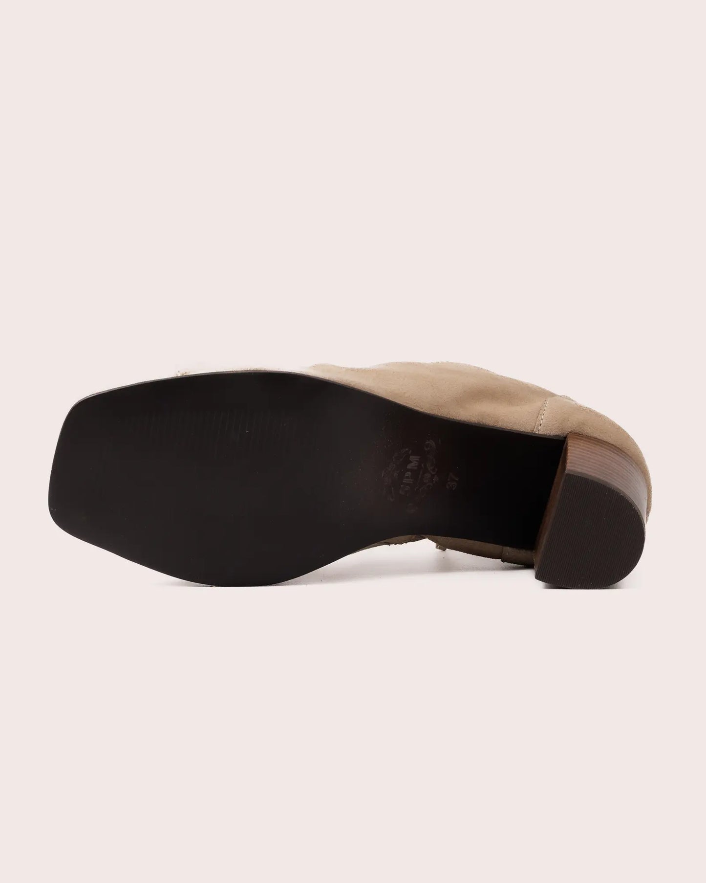 Beige suede open toe heeled sandal outsole view