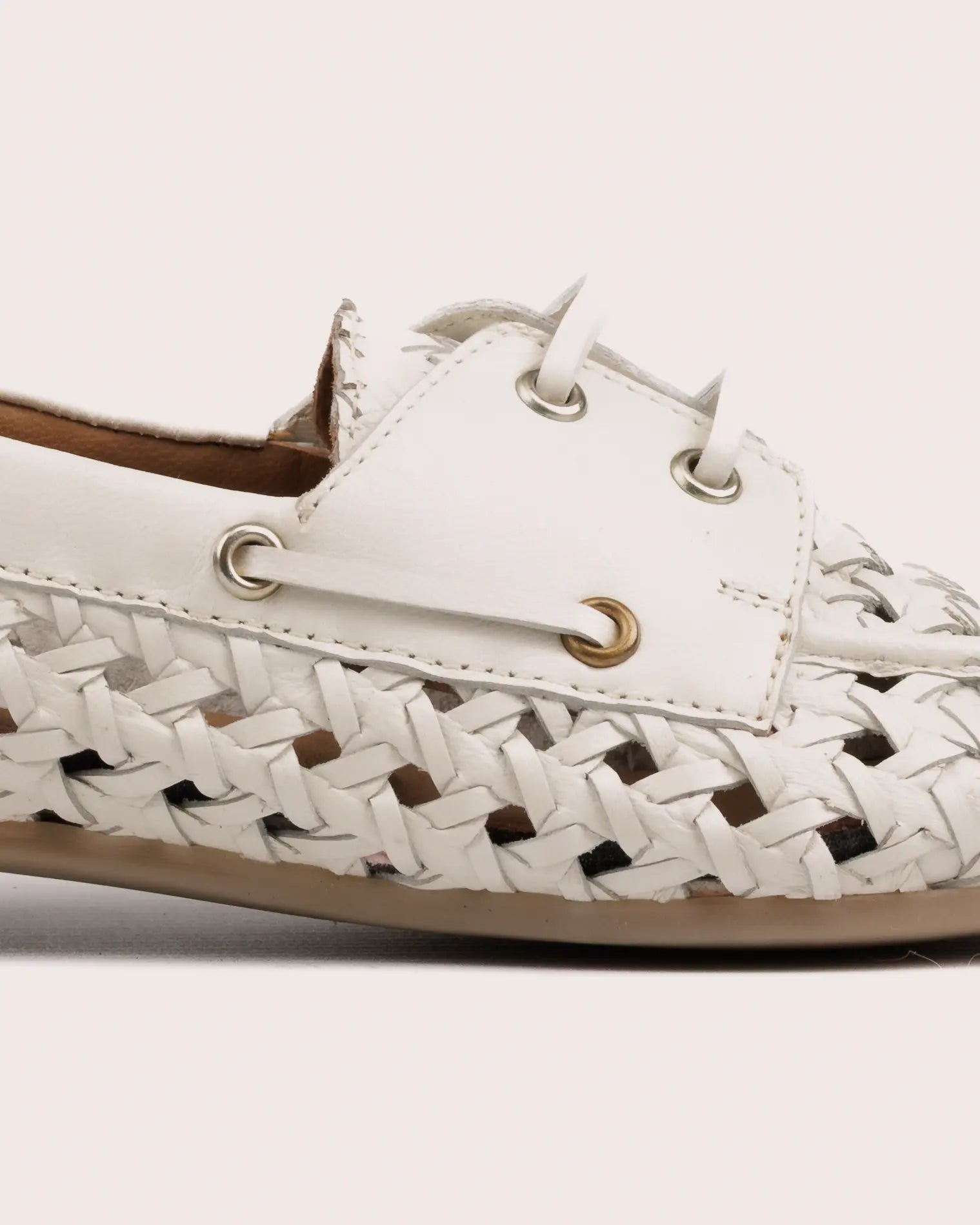 woven white leather boot shoe detail view