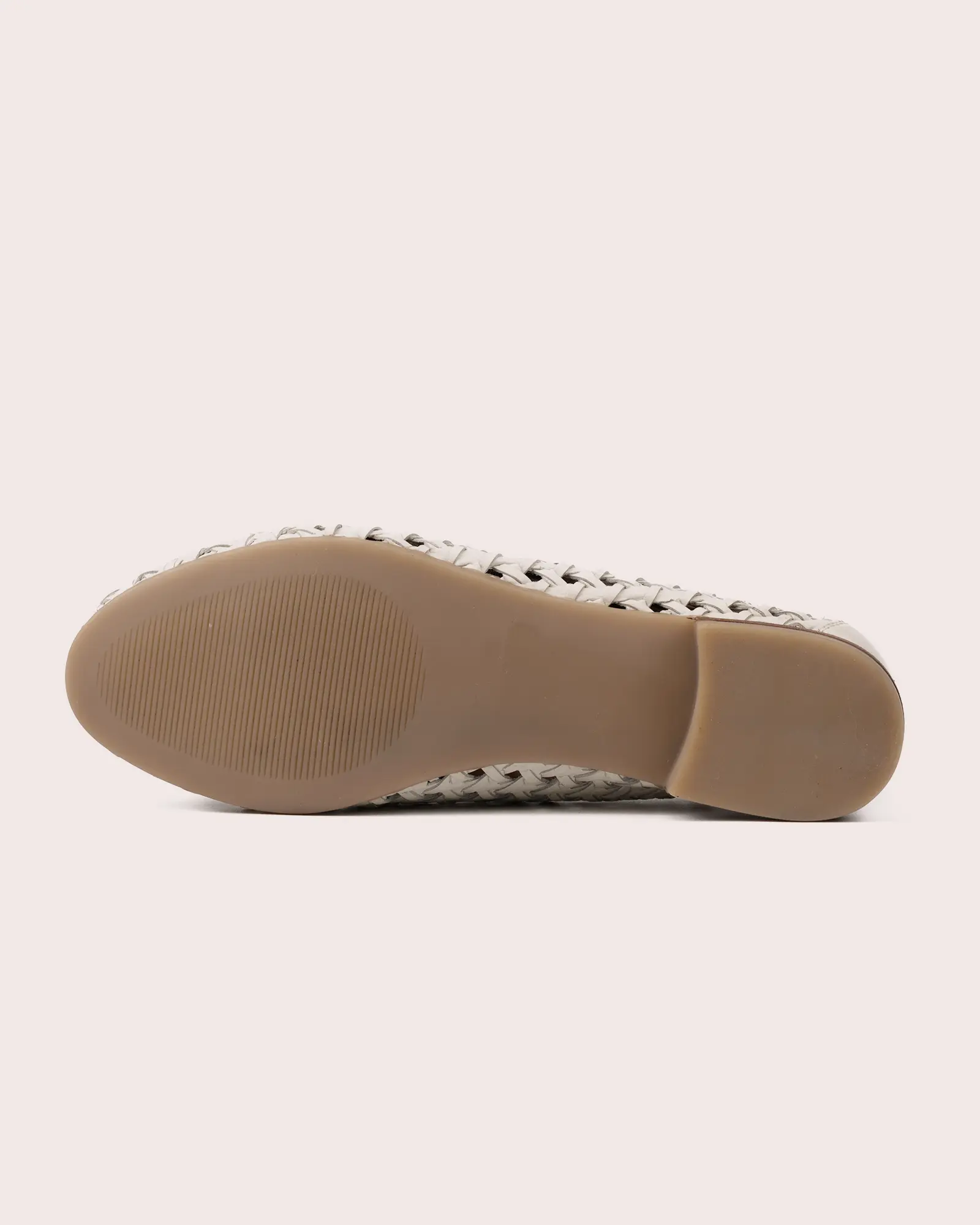 woven white leather boot shoe outsole view