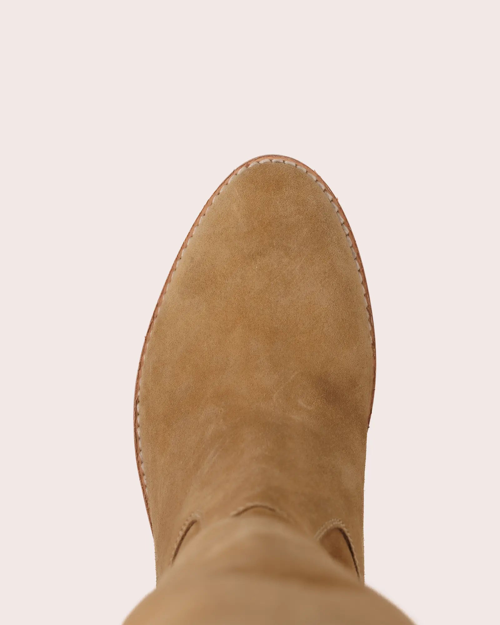 Beige suede ladies boot with inside wedge top view