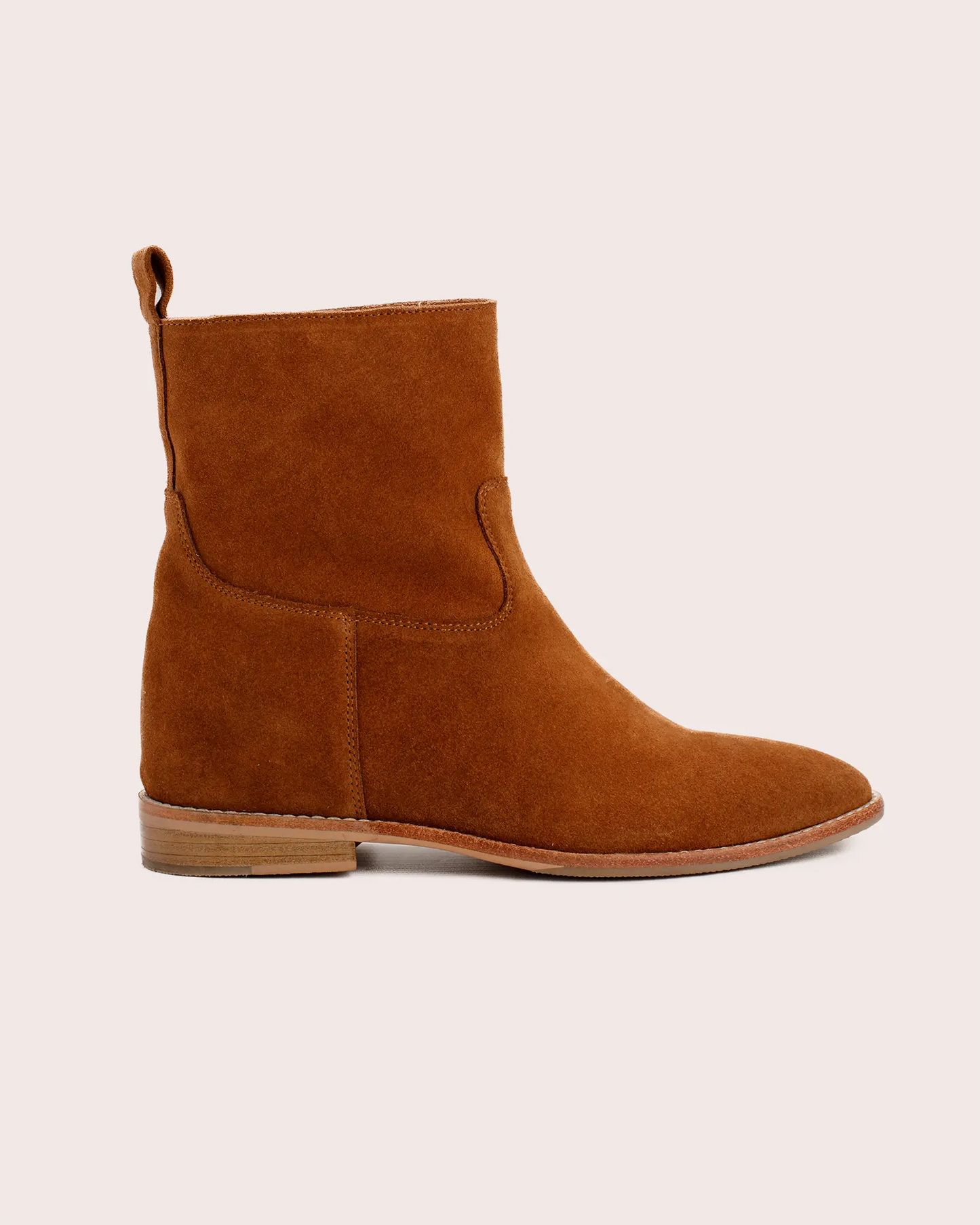 Tan suede ankle boot with inside wedge side view