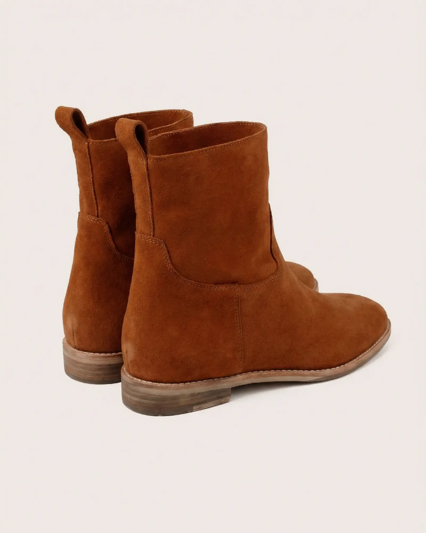 Tan suede ankle boot with inside wedge side view