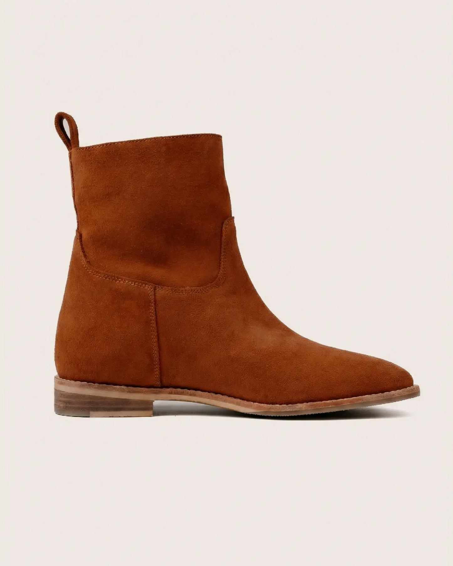 Tan suede ankle boot with inside wedge side view